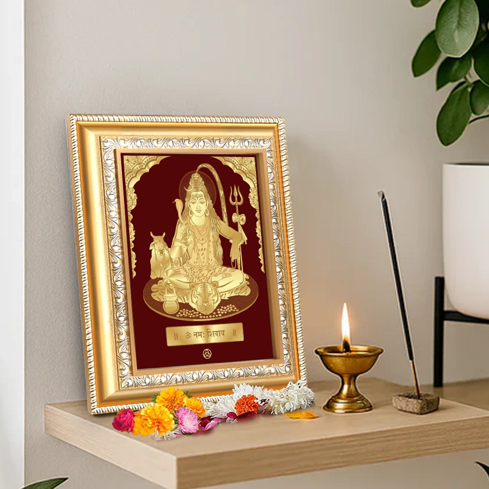 Lord Shiva with Nandi divine love wall hanging in gold frame, adorned with flowers and incense, showcasing spiritual elegance.