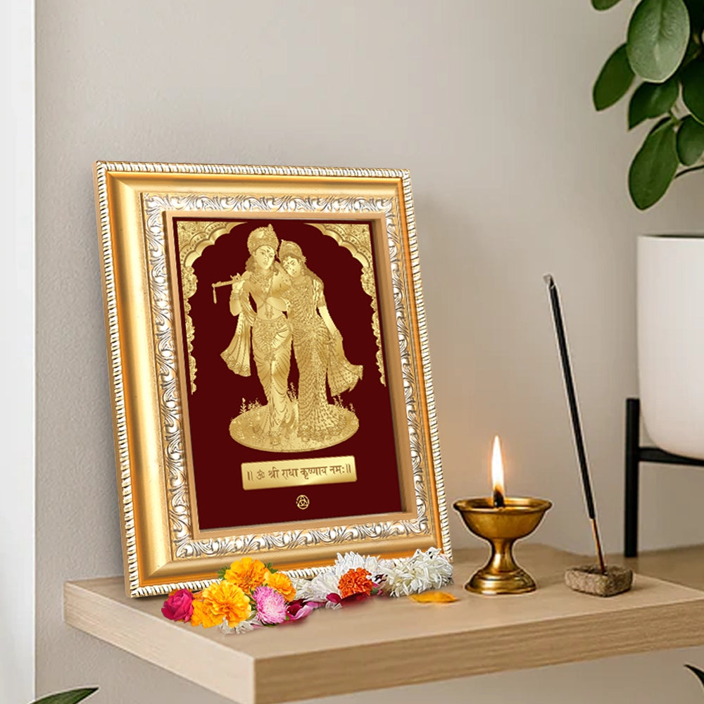 Radha Krishna wall hanging in 24K gold plated foil, showcasing divine love on a decorative frame.