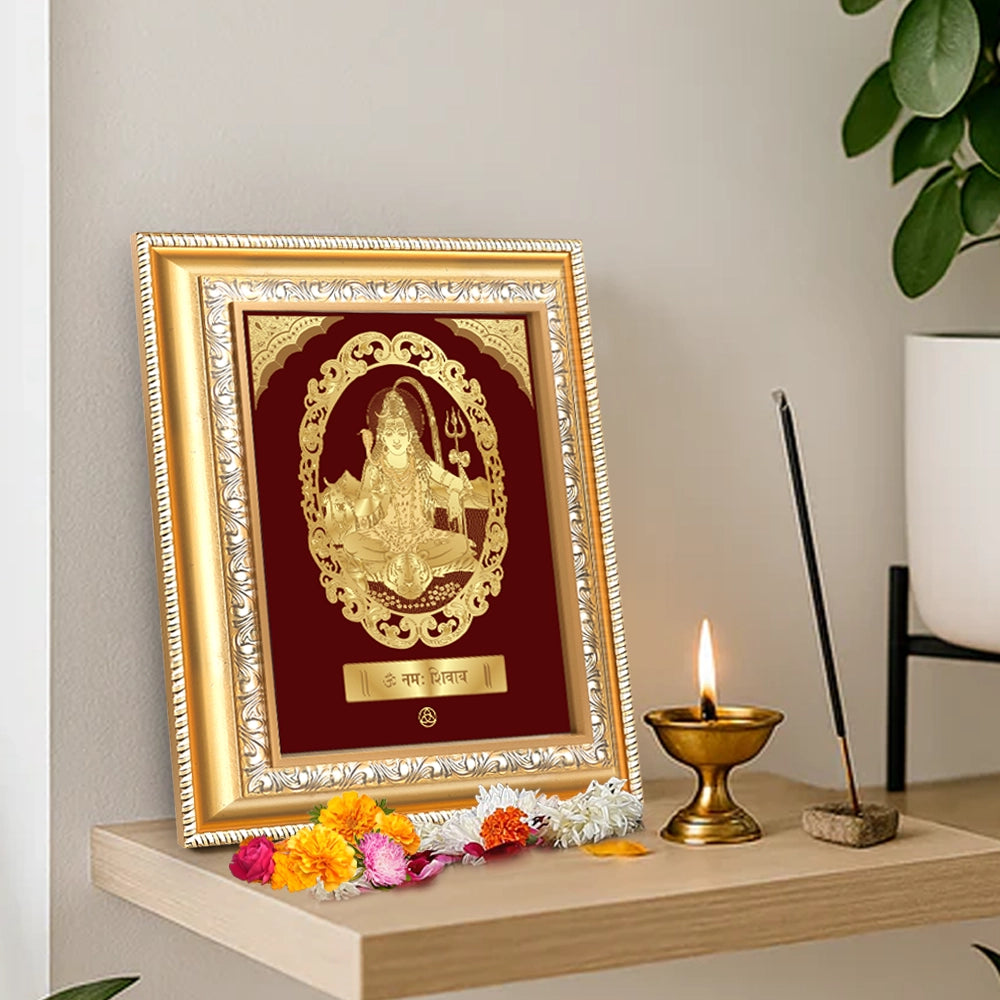 Shiva with Arch divine love wall hanging in gold frame, adorned with flowers and incense, showcasing spiritual elegance.
