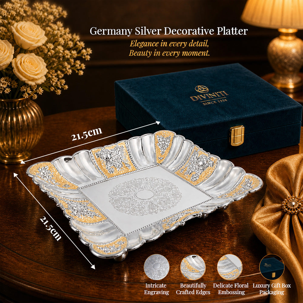 Diviniti Gold Accent German Silver Decorative Platter with Luxury Gift Box on wooden table, showcasing intricate design and elegance.