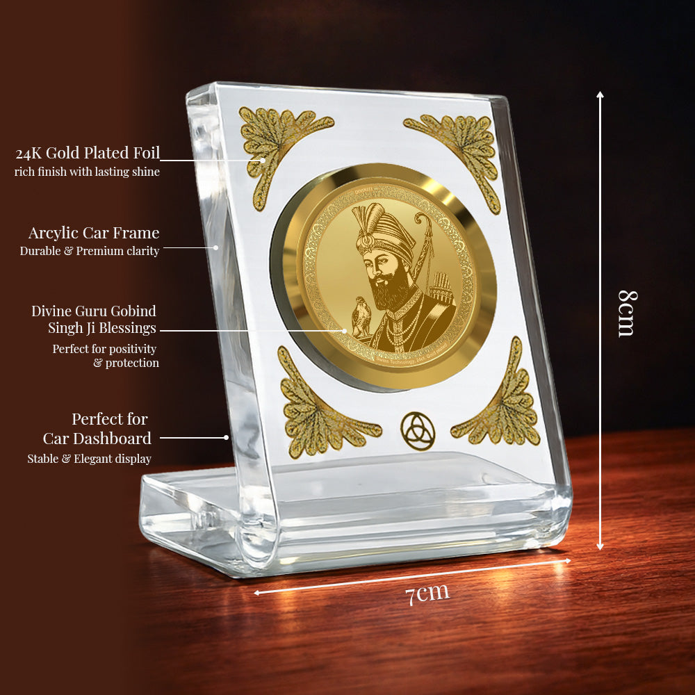 Guru Gobind Singh Ji 24K gold plated car dashboard frame with crystal-clear acrylic design for elegance and spirituality.