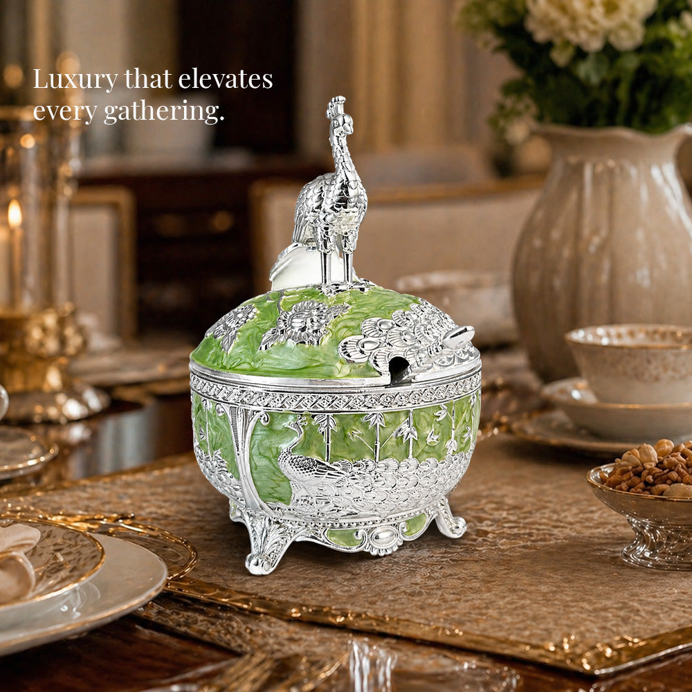 Diviniti German Silver Peacock Sugar Bowl with Spoon in green finish on dining table, luxury gift item.