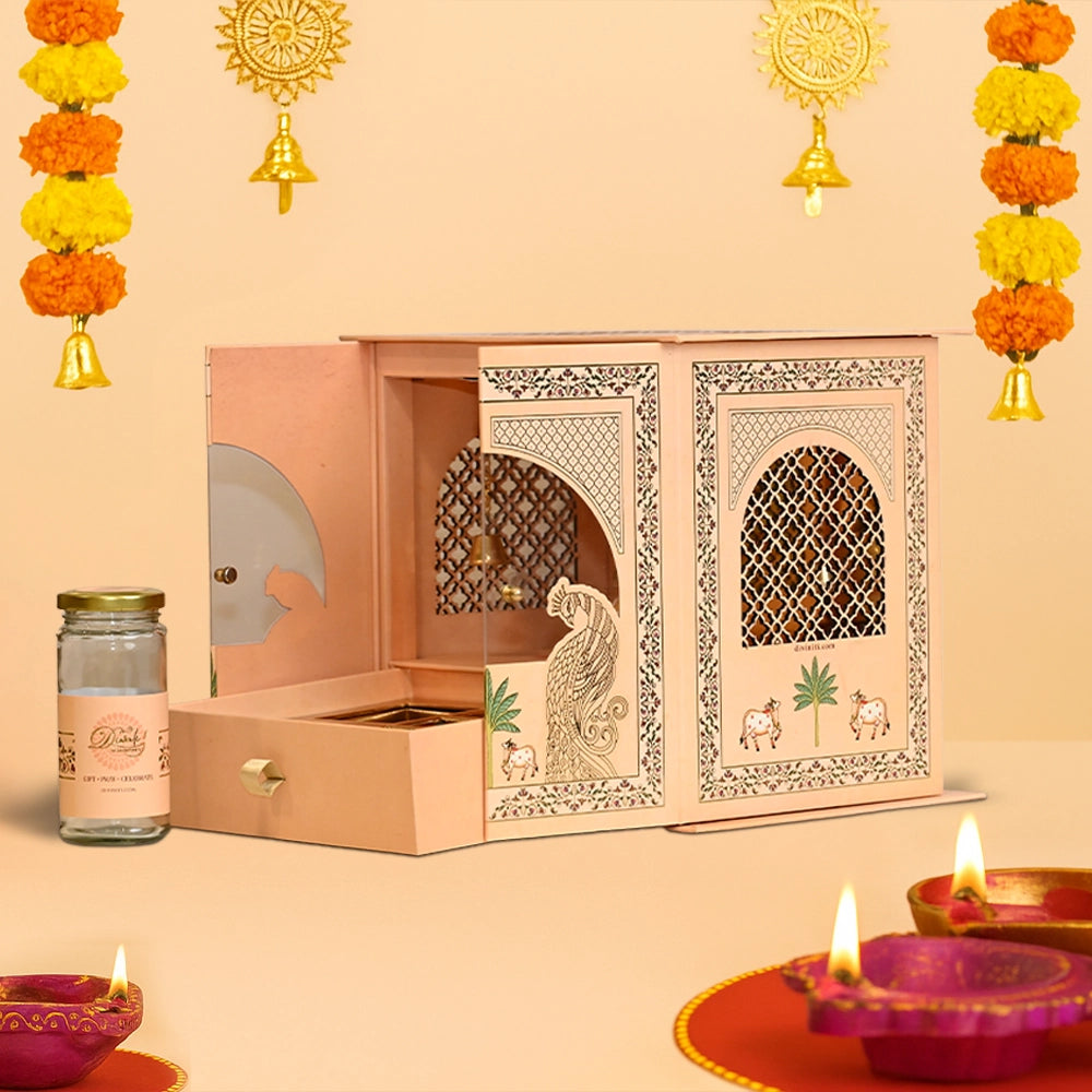 Diwali Gift Hamper | Ceramic Ganesha Idol, Brass Bells & Premium Glass Jar with Premium Compartment Designer Box