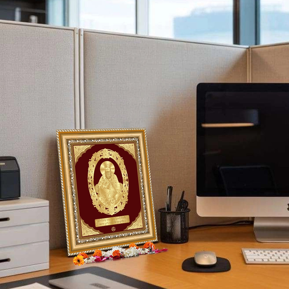 Guru Nanak Dev Ji Gold Wall Hanging Frame displayed on office table
