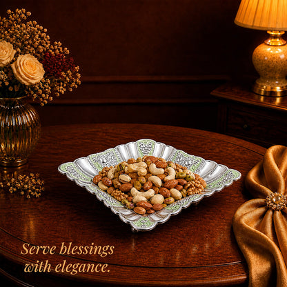 Diviniti Green German Silver Decorative Platter showcasing mixed nuts on an elegant table setting.