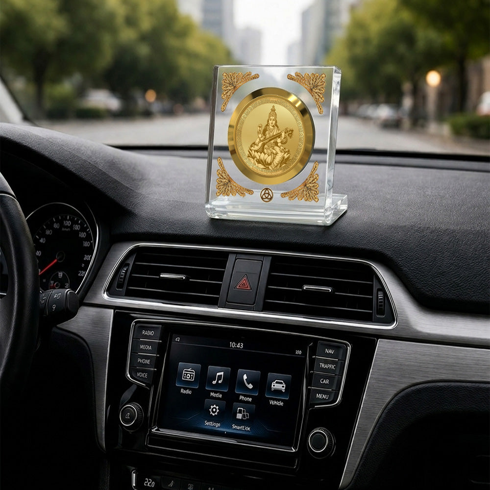 Saraswati Mata car dashboard frame featuring 24K gold plating in a premium crystal-clear frame.