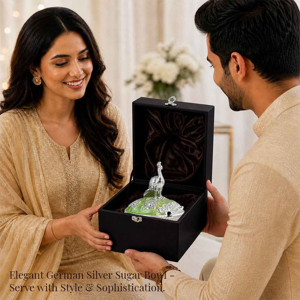 Diviniti German Silver Peacock Sugar Bowl with Spoon displayed in a luxury gift box, showcasing elegance and sophistication.
