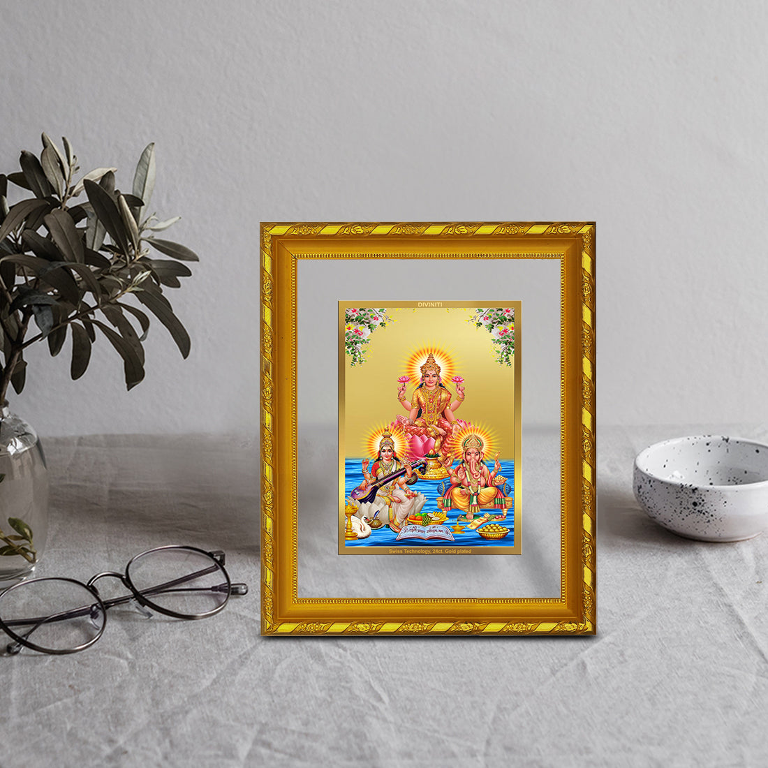 DIVINITI 24K Gold Plated Foil Lakshmi Ganesha Saraswati Photo Frame Idol for Home & Office Decor, Wall Hanging, Workshop, Table Top, Gift|DG103 Size 2 (22.6x18.4 CM)
