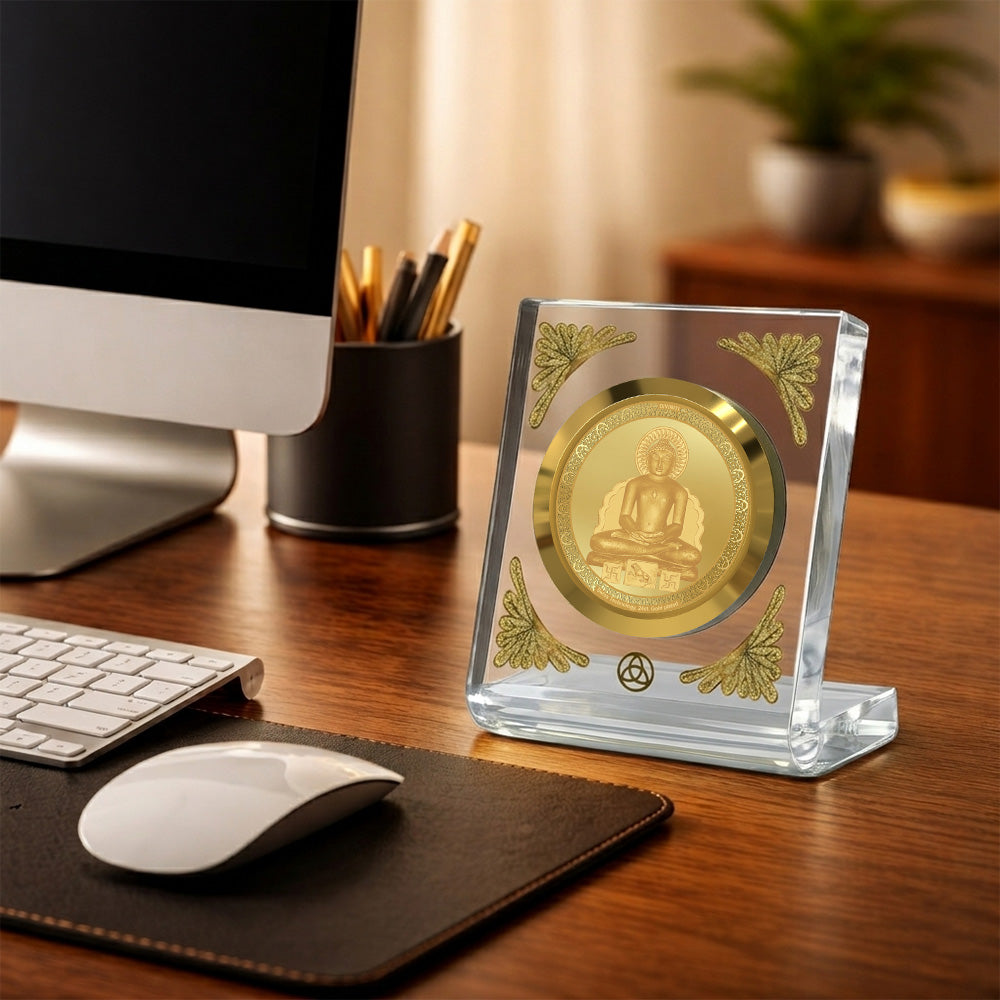 Lord Mahavir 24K gold plated frame on a desk, enhancing workspace aesthetics with divine elegance.