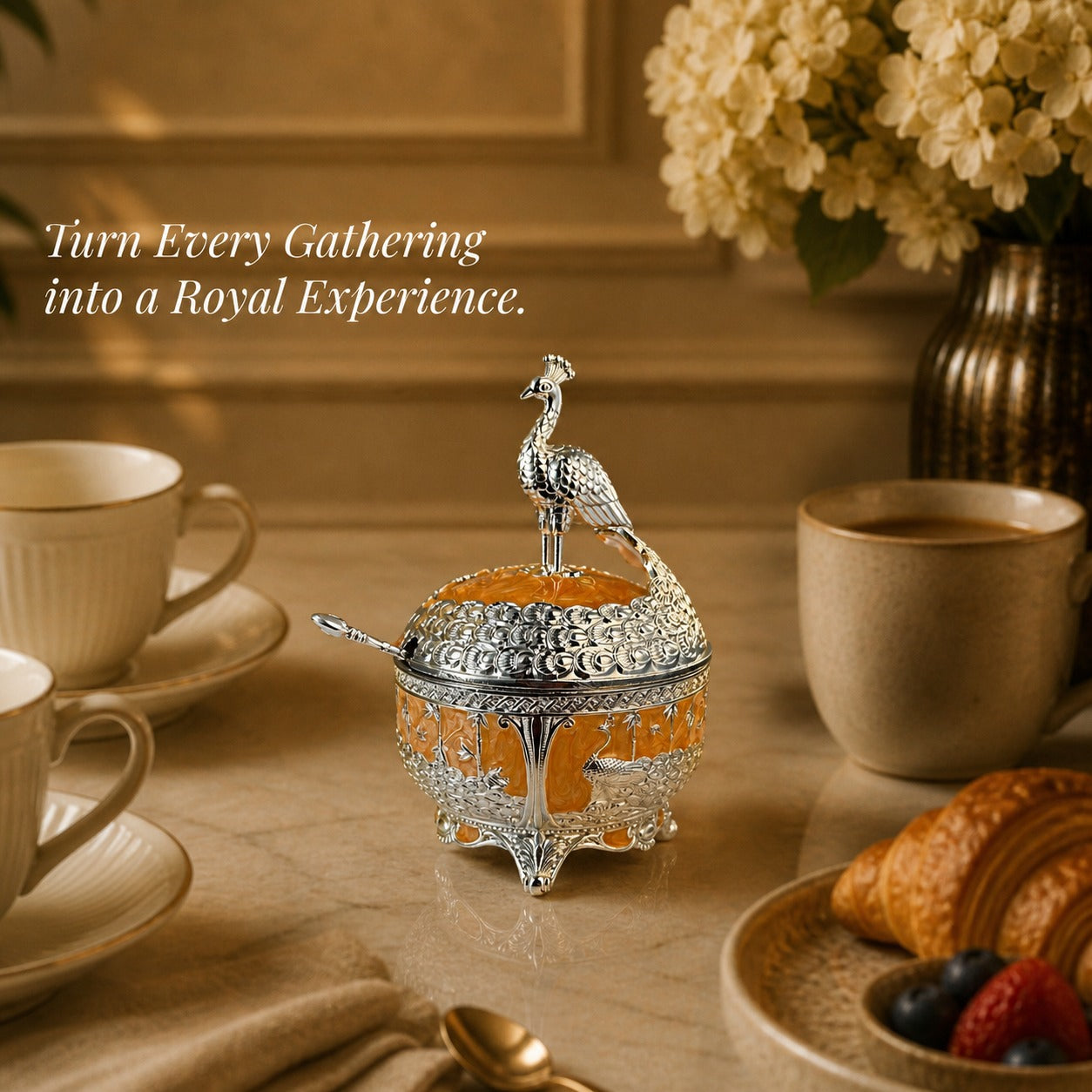 Diviniti German Silver Peacock Sugar Bowl with Spoon & Luxury Gift Box displayed elegantly on a dining table.