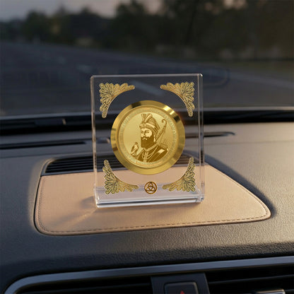 Guru Gobind Singh Ji 24K gold plated frame displayed on a car dashboard, enhancing beauty and spirituality.