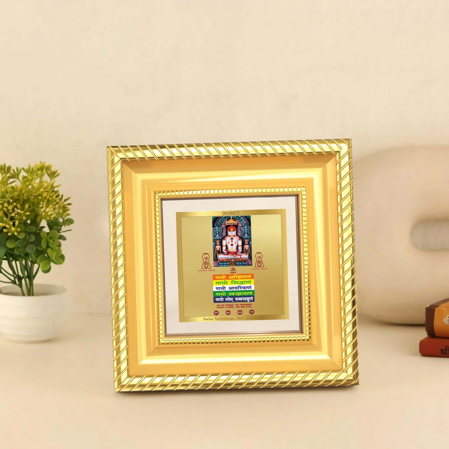 Lord Adinath Namokar Mantra Photo frame displayed on wooden shelf