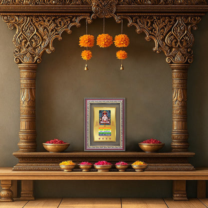 Diviniti Adinath Namokar Mantra Gold Plated Photo Frame showcased between ornate pillars above a Lord Ganesha idol in a serene traditional temple interior