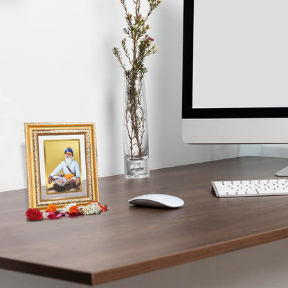 Baba Deep Singh Ji Tabletop Photo Frame in 24K Gold Plated Foil displayed on wooden table