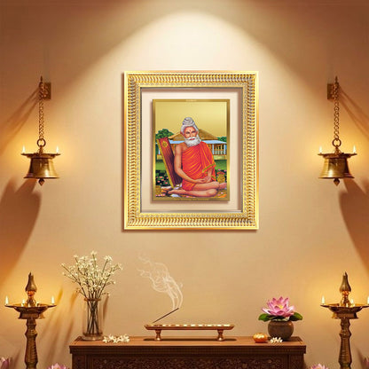 Baba Lokenath gold plated frame showcased in an elegant setting with traditional decor and lighting.