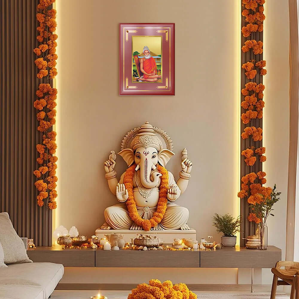 Baba Lokenath Tabletop Photo Frame in 24K Gold Plated Foil displayed on wall 