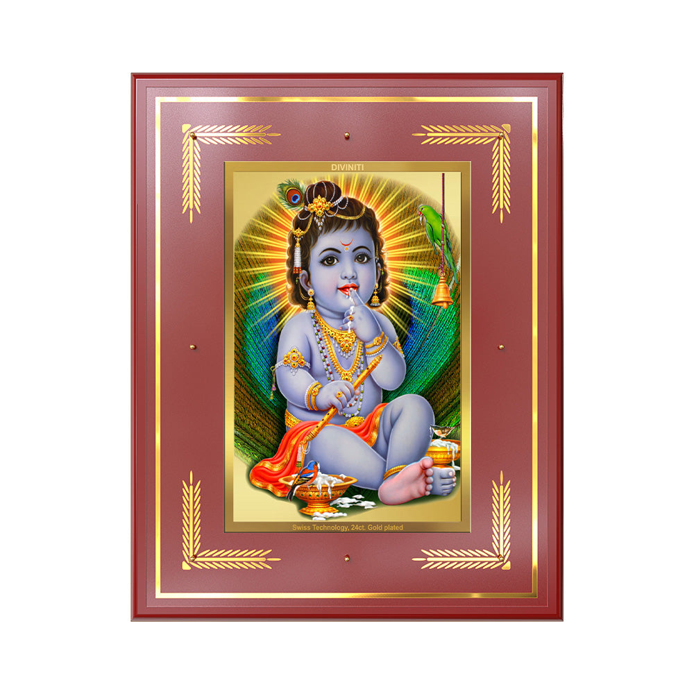 Baby Krishna wall photo frame depicting Lord Krishna enjoying butter in a beautifully crafted 24K gold plated frame.