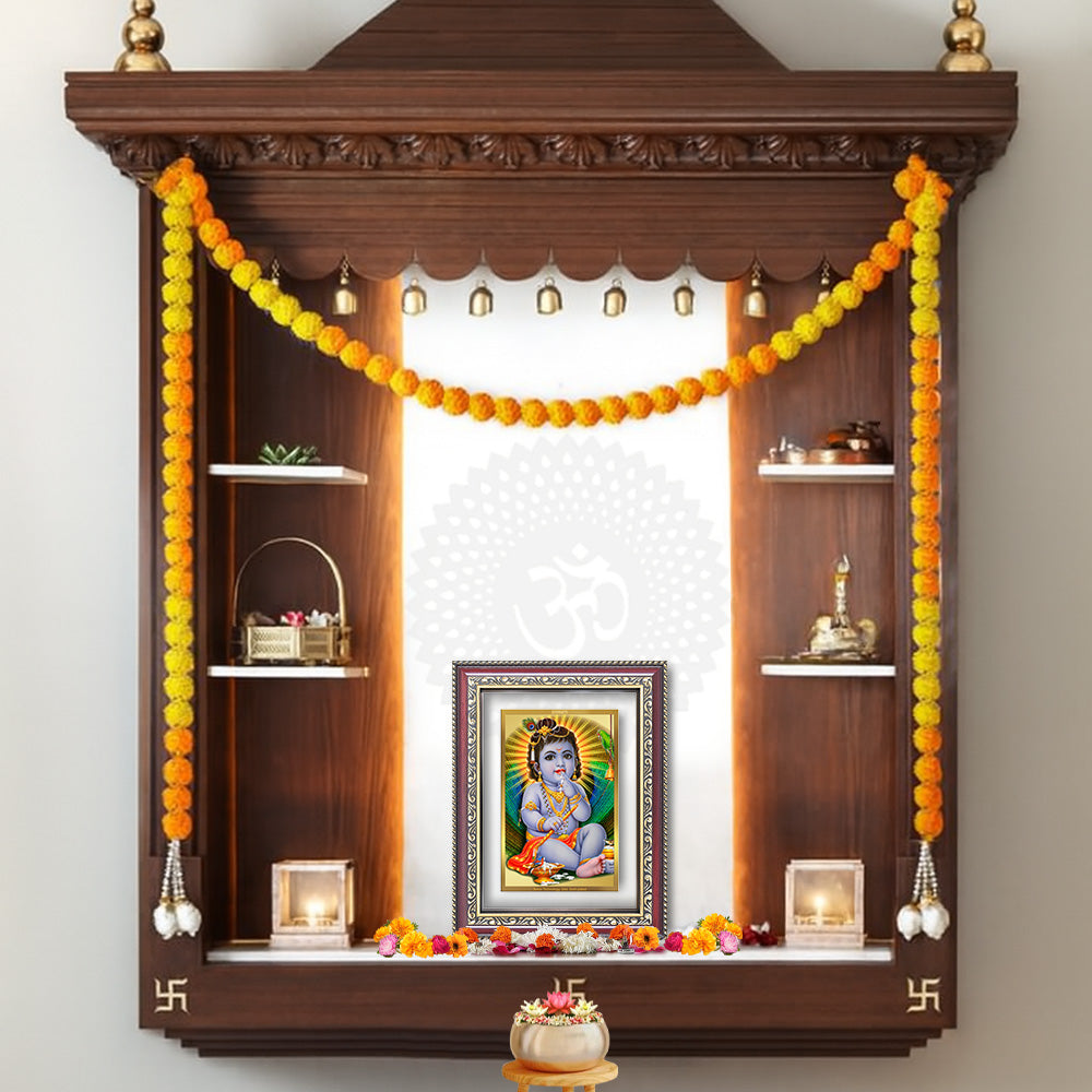 Bal Gopal | Baby Krishna wall and tabletop photo frame displayed in a beautifully decorated wooden shrine.