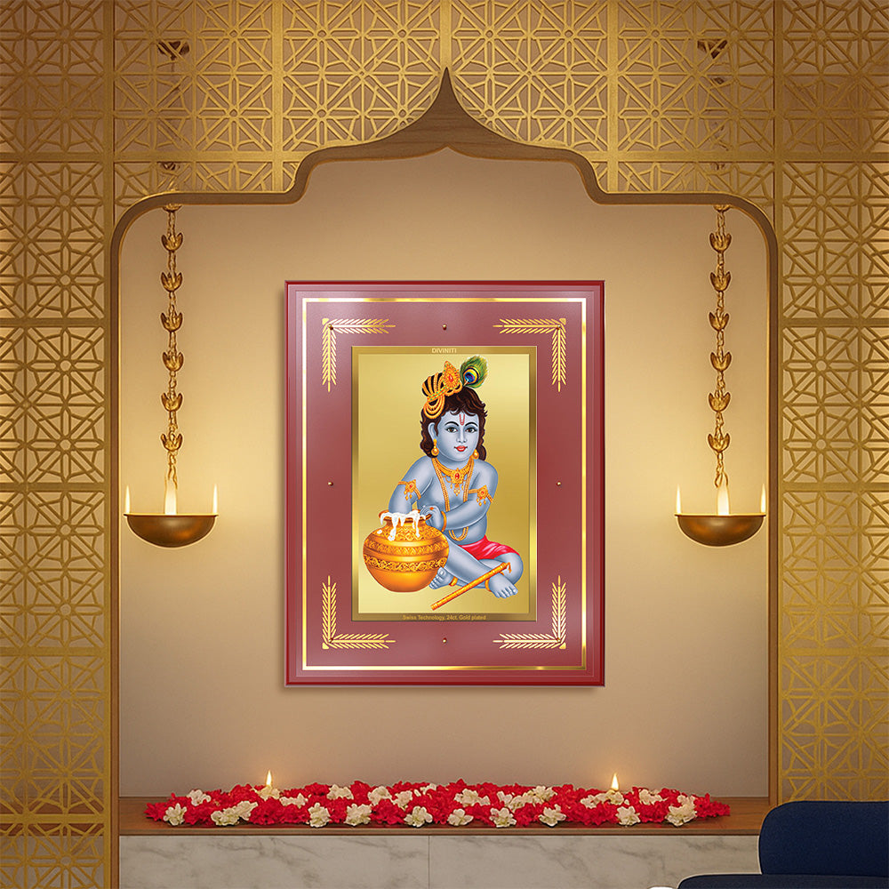 Makhan Gopal photo frame | Baby Krishna | Devakinandana Wall Photo Frame in 24K Gold Plated Foil displayed on a decorated wall.