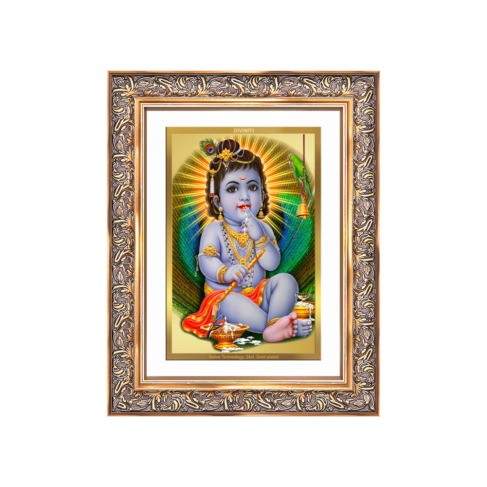 Baby Krishna gold photo frame featuring young Lord Krishna playfully enjoying butter in a stunning 24K gold plated frame.