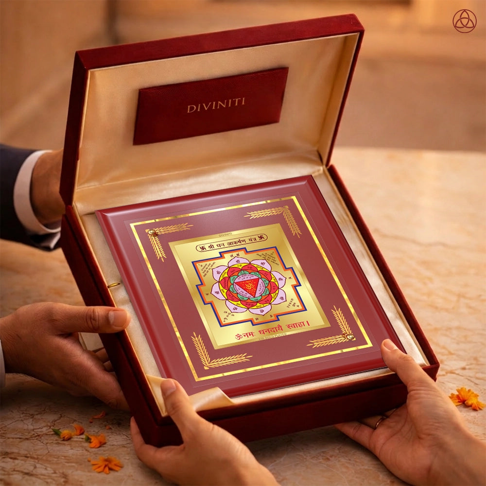 Shri Dhan Akarshan Yantra presented in an elegant box, showcasing sacred planetary symbols, perfect for harmony and prosperity.