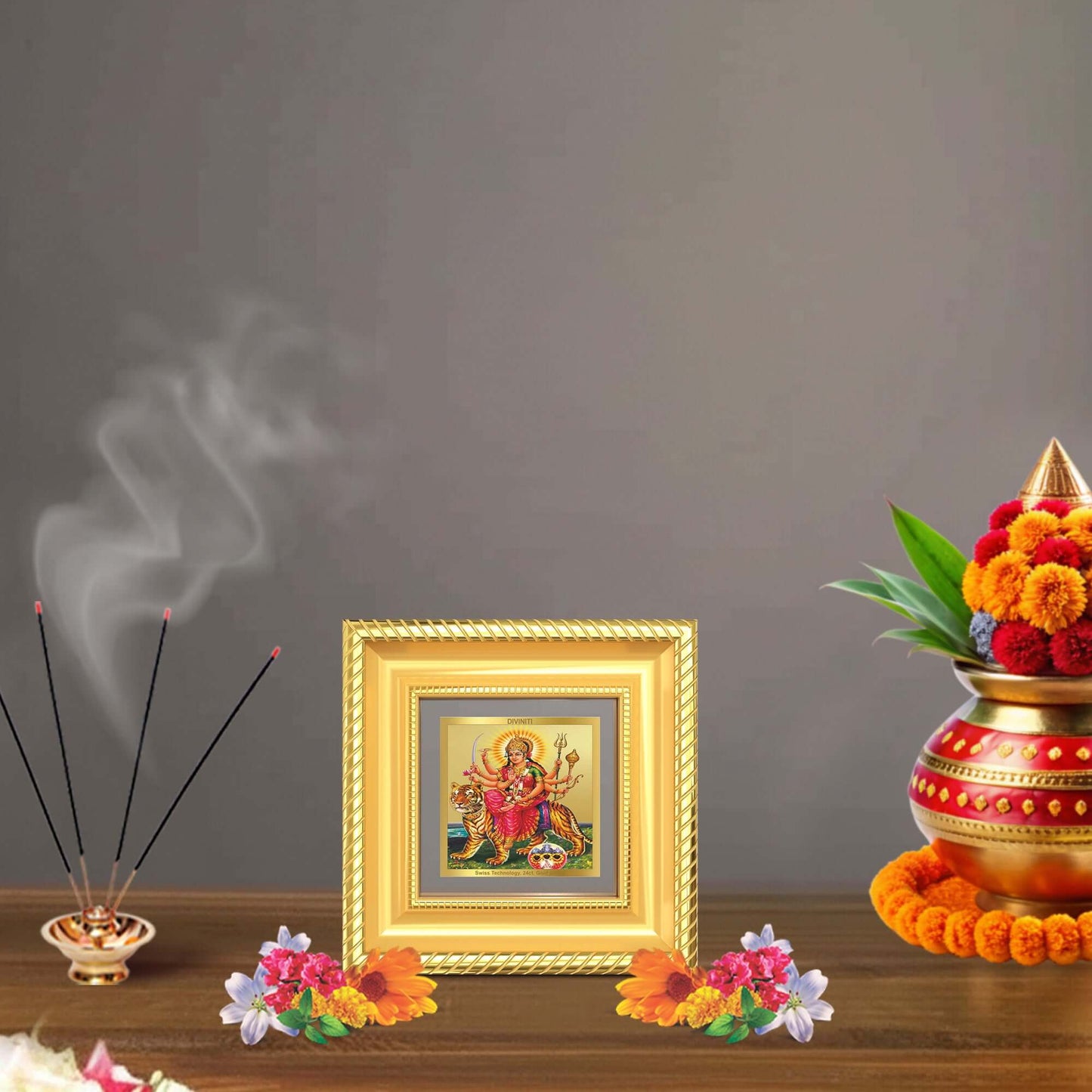 Durga Sherawali Mata tabletop frame in 24K gold plated foil arranged on table