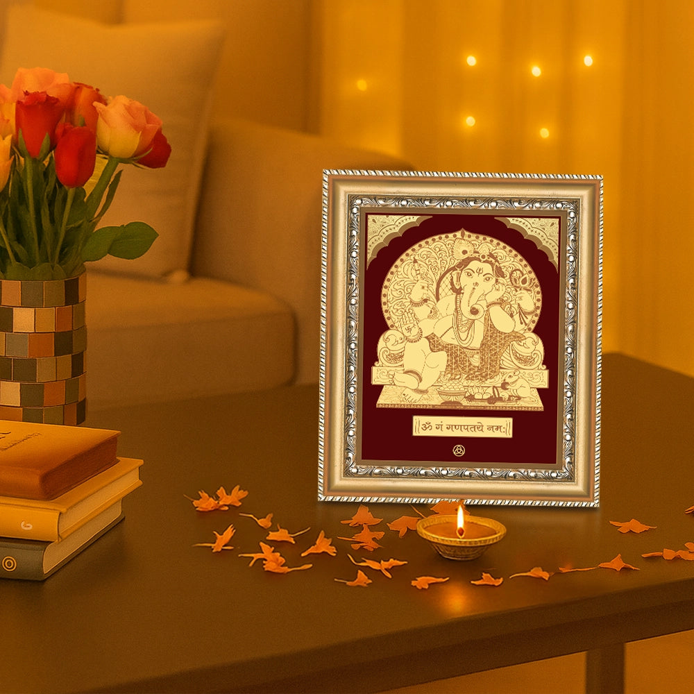 Ganesha with Throne divine love wall hanging in gold frame, adorned with flowers and incense, showcasing spiritual elegance.