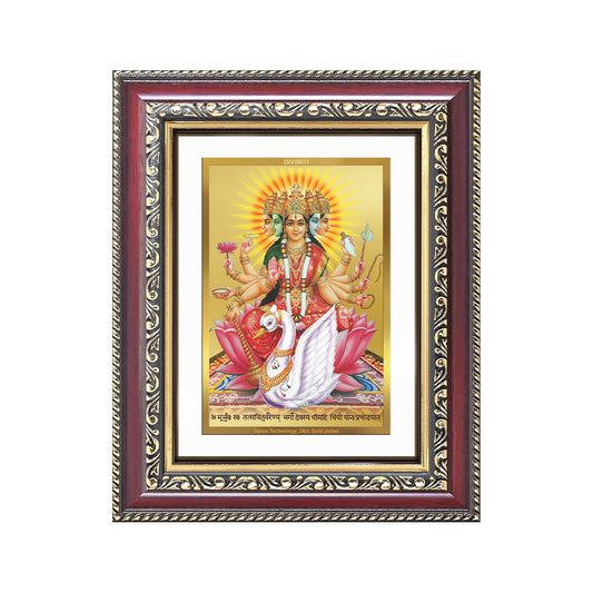 Gayatri Mata photo frame in ornate design with vibrant colors and lotus, symbolizing wisdom and light.