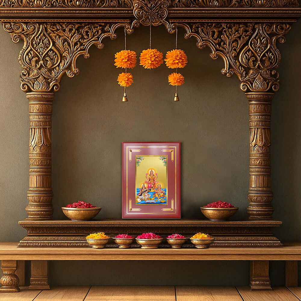 Goddess Lakshmi Saraswati & Lord Ganesha displayed on wooden home temple
