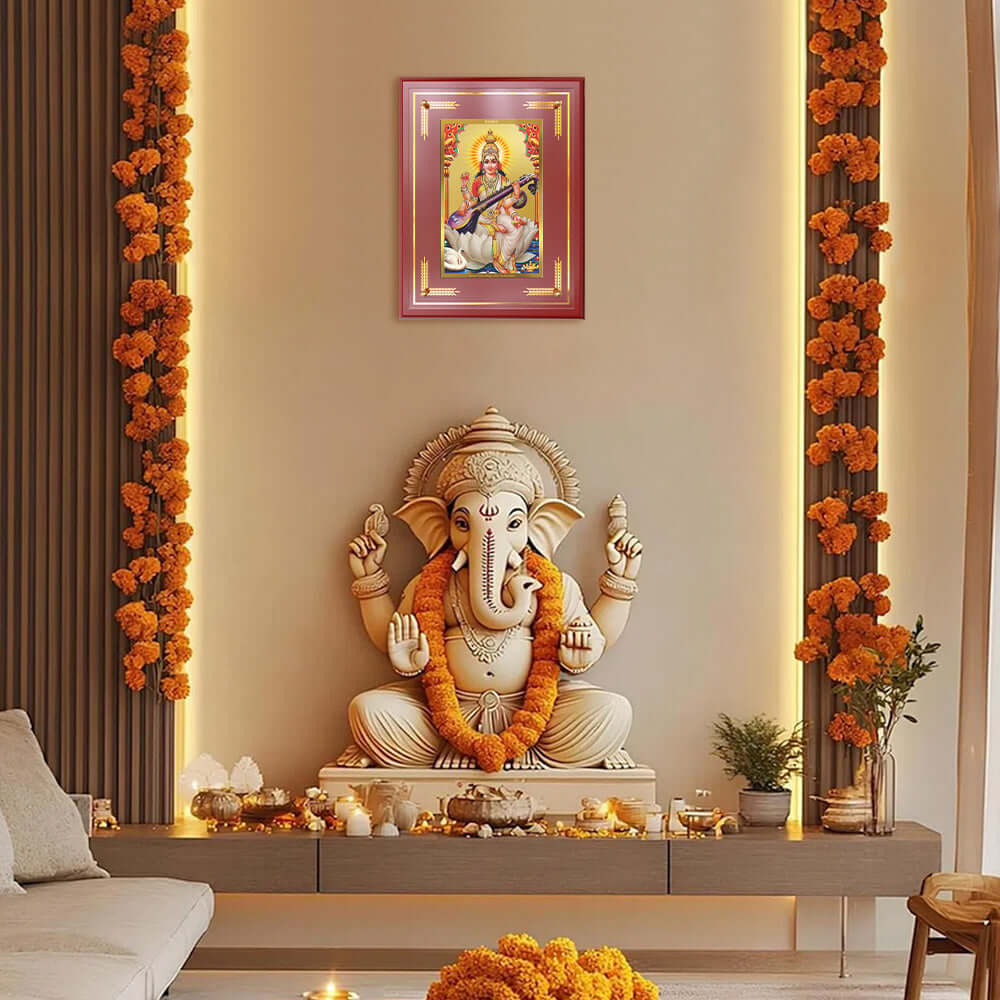 Goddess Saraswati Photo Frame isplayed in a beautifully decorated wooden wall shrine.