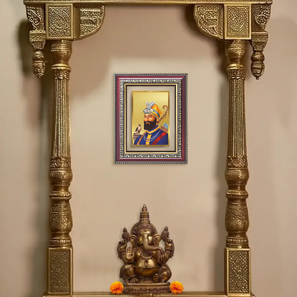 Guru Gobind Singh Ji Photo Frame in 24K Gold Plated Foil displayed on wall