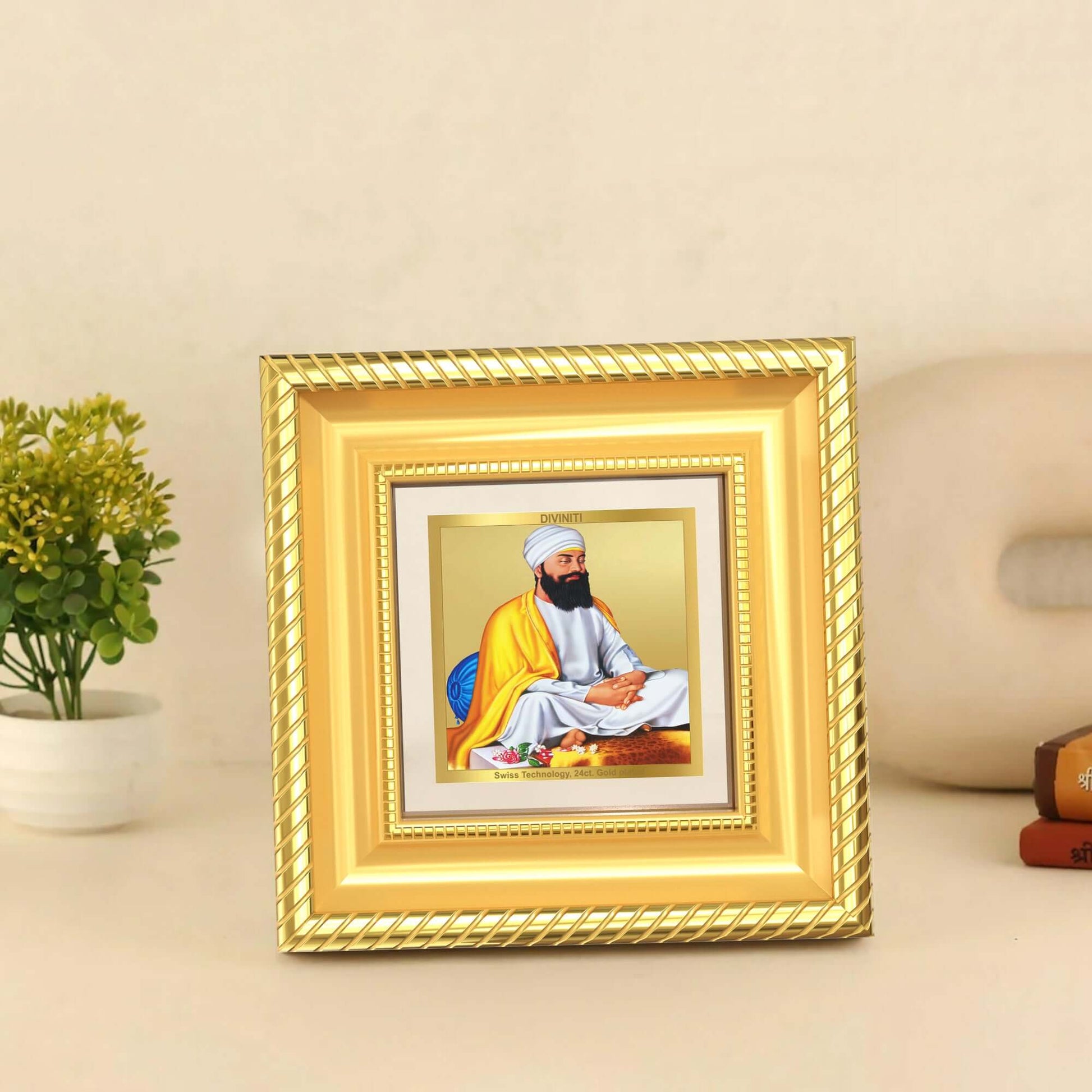 Guru Tegh Bahadur Sahib Ji Tabletop Frame displayed in a beautifully decorated wooden table