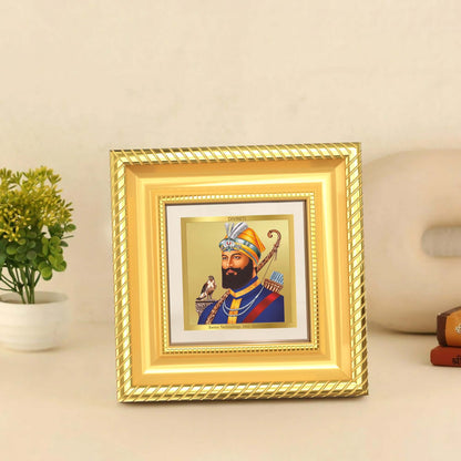 Guru Gobind Singh Ji Tabletop Frame displayed on wooden table