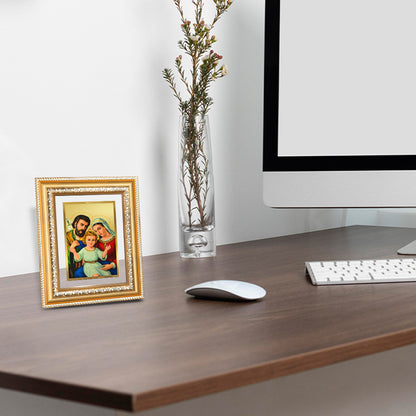 Holy Family Tabletop Photo Frame in 24K Gold Plated Foil displayed on table