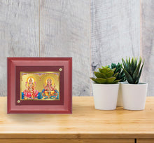 Load image into Gallery viewer, DIVINITI Lakshmi &amp; Ganesha Gold Plated Wall Photo Frame, Table Décor| MDF 1 Wooden Wall Photo Frame and 24K Gold Plated Foil| Religious Photo Frame Idol For Pooja, Gifts Items (16.5CMX14.0CM)
