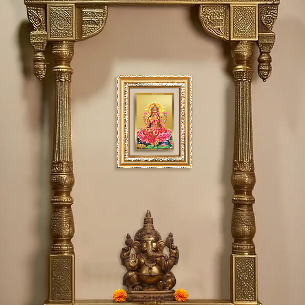 Goddess Lakshmi wall and tabletop photo frame in ornate golden decor with Ganesh statue.