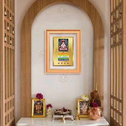 Adinath Namokar Mantra Gold Plated Worship Photo displayed on home temple wall
