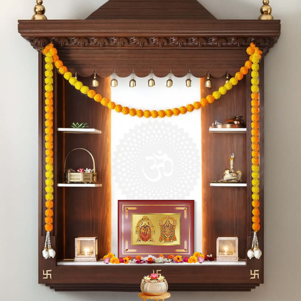 Lord Venkateswara Tirupati Balaji & Goddess Padmavati framed in a decorative temple shelf with garlands and offerings.