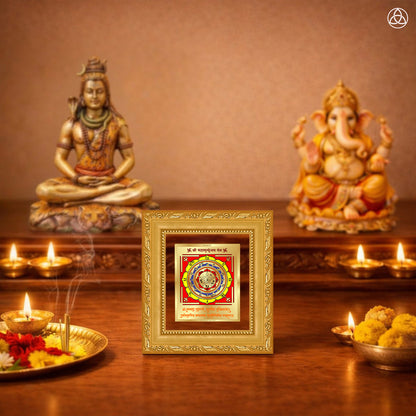 Maha Mrityunjay Yantra displayed on a decorated altar with candles and idols of Hindu deities for spiritual harmony.
