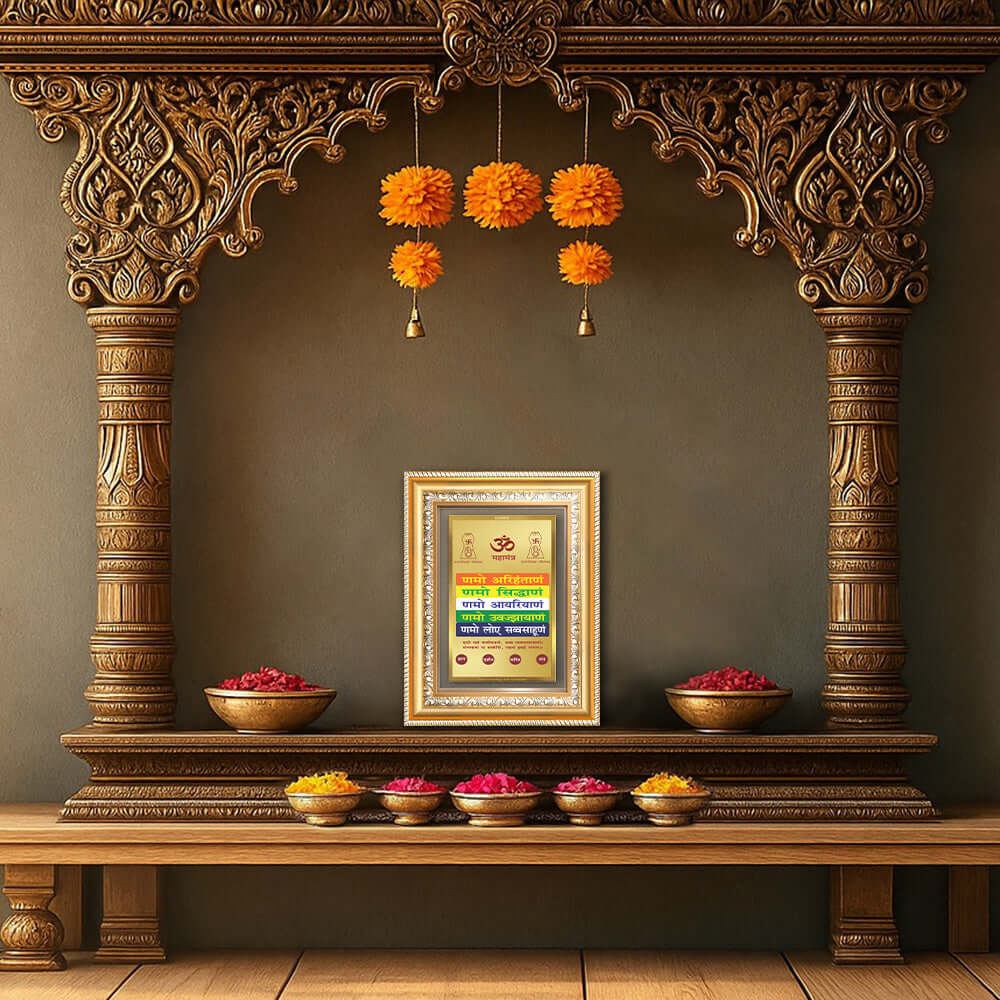 Namokar Mantra in a beautifully designed wall and tabletop photo frame, adorned with vibrant marigold flowers.