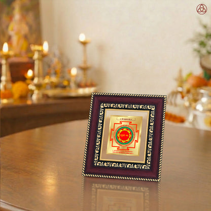 Panchmukhi Hanuman Yantra framed artwork in a spiritual setting with Lord Shiva and Ganesh statues.