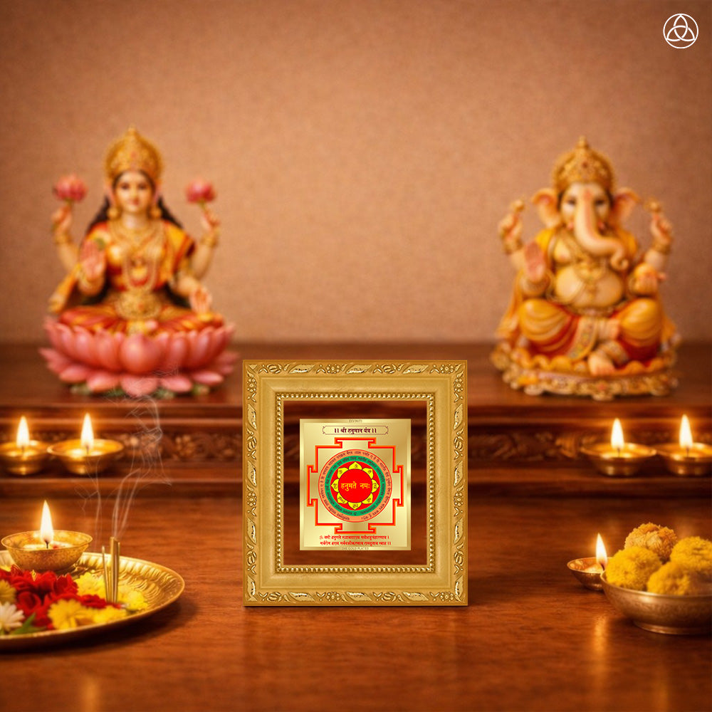 Panchmukhi Hanuman Yantra displayed in a decorative frame on a wooden table, symbolizing planetary energies.