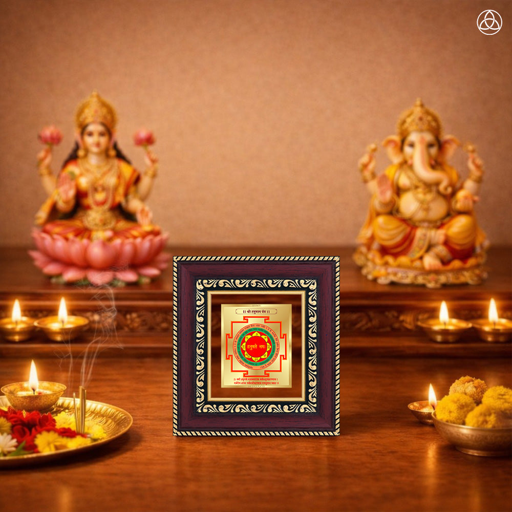 Panchmukhi Hanuman Yantra beautifully displayed in an ornate frame on a decorative table setting.