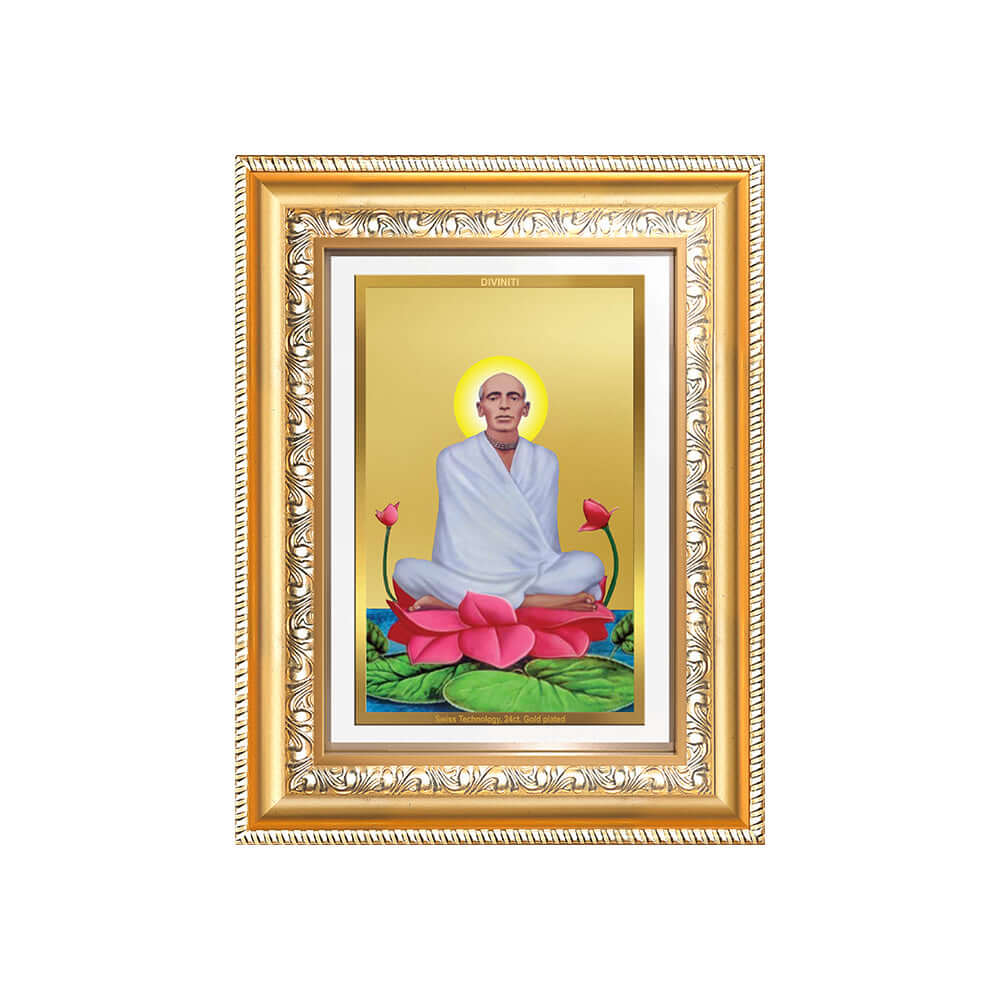 24K gold plated photo frame of Saint Ram Thakur with lotus design and golden finish.