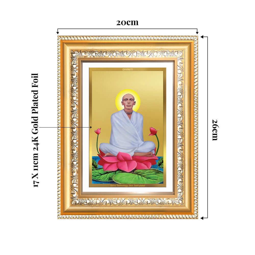 24K gold plated photo frame of Saint Ram Thakur with vibrant lotus design, dimensions 20cm x 26cm.