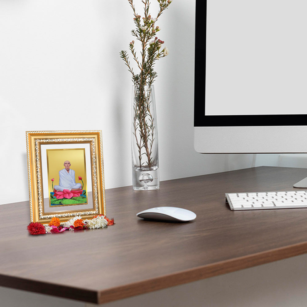 Saint Ram Thakur Wall and Tabletop Photo Frame in 24K Gold Plated Foil displayed on wooden table 