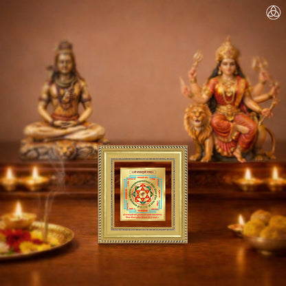 Shree Baglamukhi Yantra framed artwork on a decorative table with deities and incense.