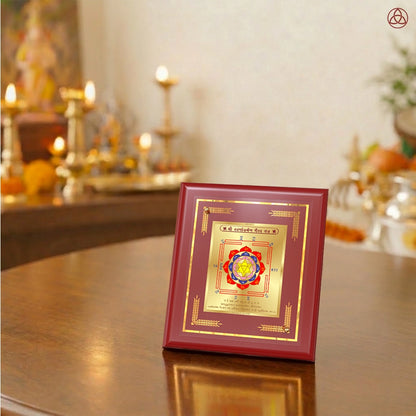 Swarn Akarshan Yantra framed in 24K gold plated foil, symbolizing balance of planetary energies and harmony.