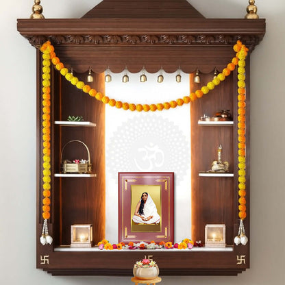 Sarada Devi wall and tabletop photo frame in 24K gold plated foil, displayed in a beautifully adorned wooden altar.