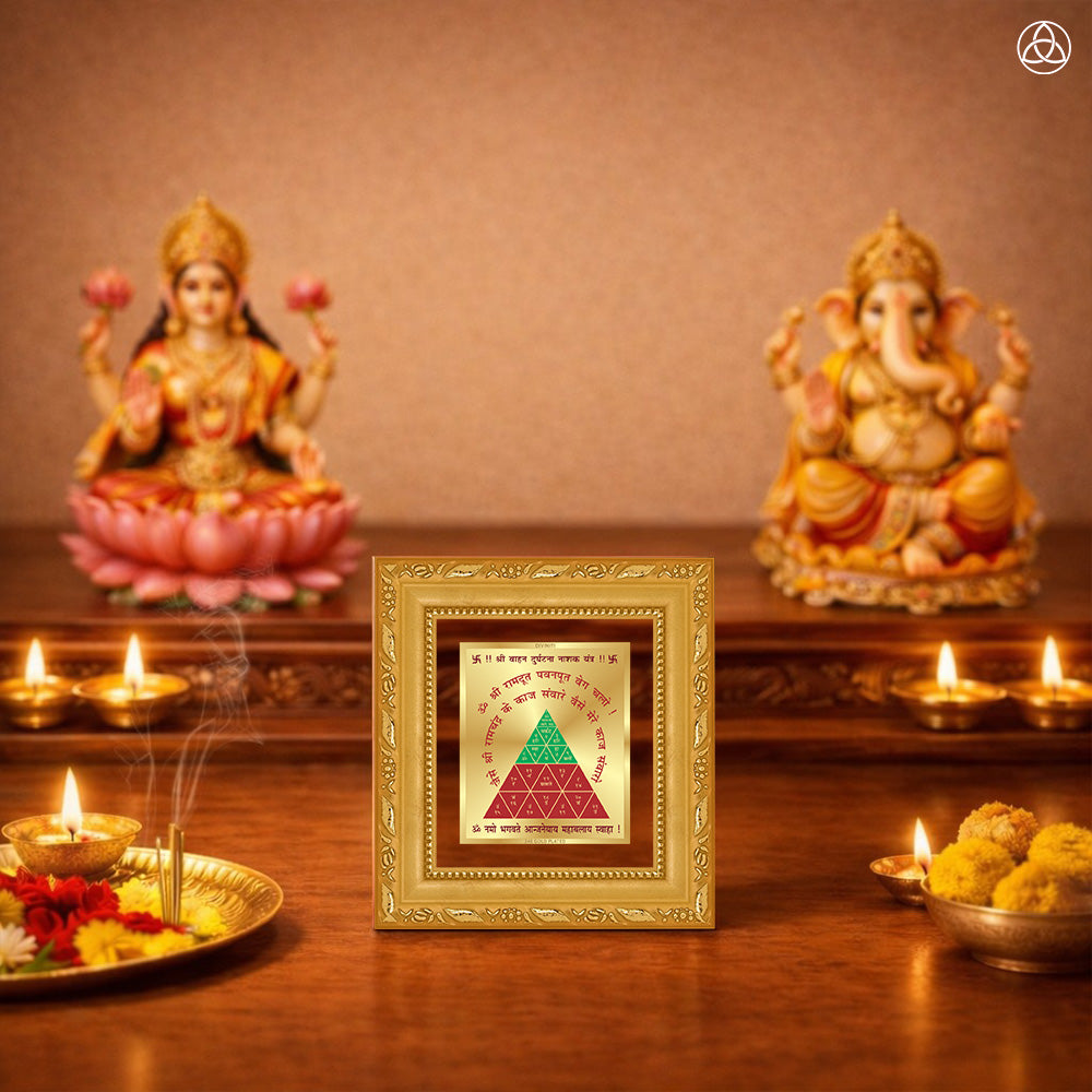 Vahan Durghtna Yantra displayed on a decorated altar with candles and idols of Hindu deities for spiritual harmony.
